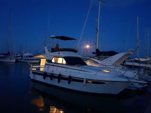 Evening flybridge motor yacht